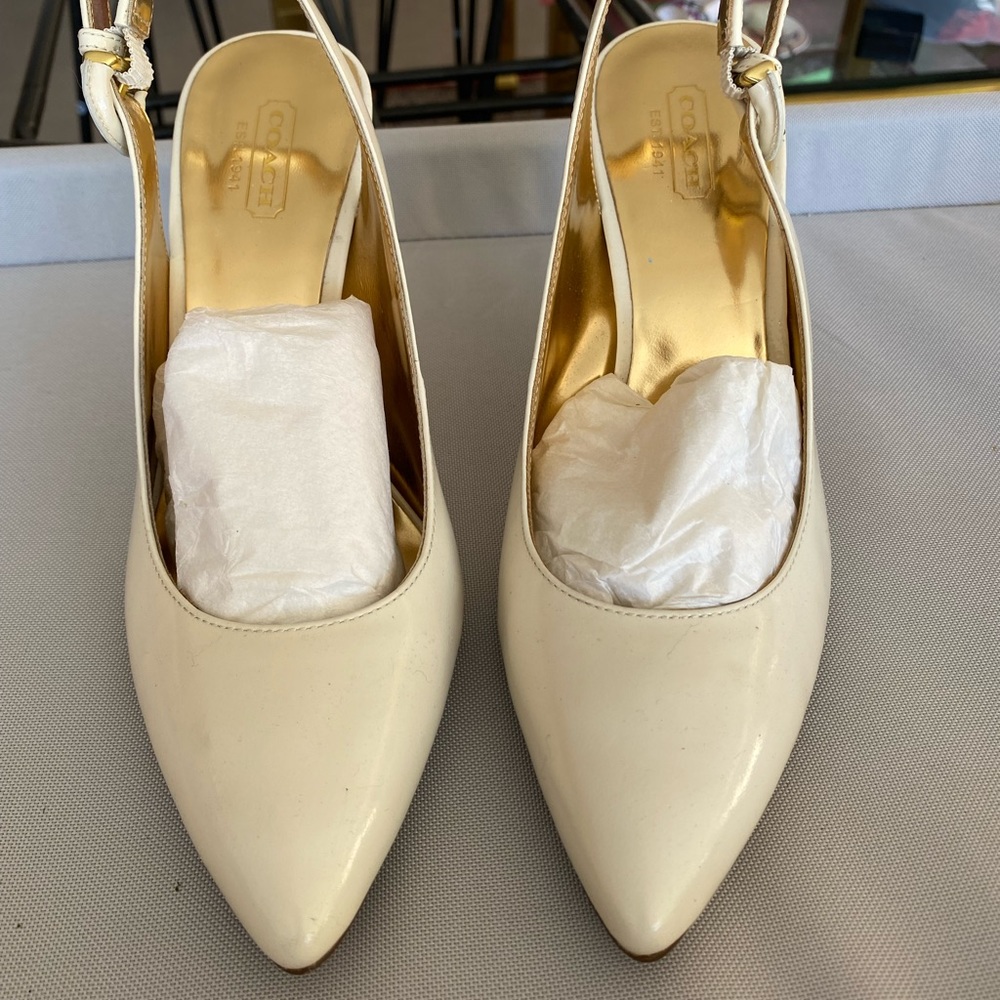 Classic Coach heels size 6. Never worn!